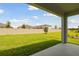 Covered patio overlooking a fenced-in backyard at 4837 Foxglove Cir, Lakeland, FL 33811