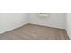 Empty bedroom with neutral carpet and window at 4837 Foxglove Cir, Lakeland, FL 33811