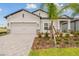 Curb appeal abounds in this one-story home featuring a welcoming front porch at 4837 Foxglove Cir, Lakeland, FL 33811