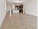 Open concept kitchen and dining area with modern appliances and tile floors at 4837 Foxglove Cir, Lakeland, FL 33811