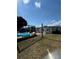 Backyard with above-ground pool and deck at 4316 Upper Meadow Rd, Mulberry, FL 33860