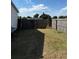 Backyard with wooden fence and gate at 4316 Upper Meadow Rd, Mulberry, FL 33860