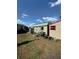 Two storage sheds in backyard, one barn style, one single door at 4316 Upper Meadow Rd, Mulberry, FL 33860
