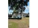 Backyard with deck and above-ground pool at 4316 Upper Meadow Rd, Mulberry, FL 33860