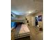 Spacious bedroom with a full-size bed and ample floor space at 4316 Upper Meadow Rd, Mulberry, FL 33860