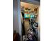 Small closet with shelving and hanging rods at 4316 Upper Meadow Rd, Mulberry, FL 33860
