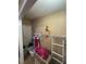 Closet with shelving and hanging space for clothes and storage at 4316 Upper Meadow Rd, Mulberry, FL 33860