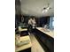 Kitchen with dark cabinets and an island at 4316 Upper Meadow Rd, Mulberry, FL 33860