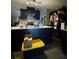 Kitchen features dark cabinetry and a light-colored countertop at 4316 Upper Meadow Rd, Mulberry, FL 33860