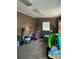 Playroom featuring built-in shelving and a spacious layout at 4316 Upper Meadow Rd, Mulberry, FL 33860