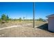 Large backyard surrounded by lush trees and greenery at 2700 Laguna Dr, Indian Lake Estates, FL 33855
