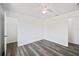 Bedroom with hard surface flooring, ceiling fan, and closet at 2700 Laguna Dr, Indian Lake Estates, FL 33855
