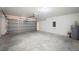 Spacious garage with ample room for parking and storage at 2700 Laguna Dr, Indian Lake Estates, FL 33855