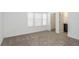 Bright bedroom with window, carpet, and closet at 4390 Sw 84Th Street Rd, Ocala, FL 34476