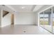 Bright dining room with sliding glass doors leading to backyard at 4390 Sw 84Th Street Rd, Ocala, FL 34476