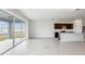 Bright dining room with sliding glass doors leading to backyard at 4390 Sw 84Th Street Rd, Ocala, FL 34476
