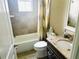 Bathroom with granite vanity, tiled shower, and neutral color scheme at 7771 Lake James Blvd, Lakeland, FL 33810