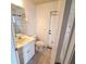 Bathroom featuring a vanity with a sink and a toilet at 5446 Pebble Beach Dr, Lakeland, FL 33812