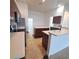 Well-equipped kitchen features stainless steel appliances, ample counter space, and dark cabinetry at 5446 Pebble Beach Dr, Lakeland, FL 33812
