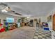 Spacious basement with ample storage and a mix of carpet and tile flooring at 22134 Obrien Rd, Howey In The Hills, FL 34737