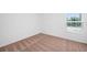 Bedroom with neutral carpet and a window at 567 Bay Leaf Dr, Poinciana, FL 34759