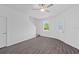 Bright living room featuring a staircase and natural light at 567 Bay Leaf Dr, Poinciana, FL 34759