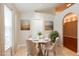 Cozy breakfast nook with a round table and four chairs, perfect for intimate meals at 31817 Sunpark Cir, Leesburg, FL 34748