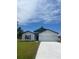 Charming single-Gathering home with a two-car garage and well-manicured lawn at 420 Marion Oaks Ln, Ocala, FL 34473