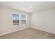 Bright bedroom featuring neutral walls and carpet at 2056 Marigold Aly, Winter Haven, FL 33884