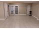 Finished basement with tile floors and French doors at 6638 Hatcher Rd, Lakeland, FL 33811