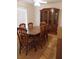 Dining room with wooden table, chairs, and a hutch at 6638 Hatcher Rd, Lakeland, FL 33811