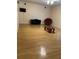Living room with hardwood floors and a ceiling fan at 6638 Hatcher Rd, Lakeland, FL 33811