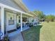 Charming entrance featuring a well-manicured lawn and inviting curb appeal at 1803 Fredricksburg Ave, Lakeland, FL 33803
