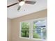 Bedroom with two large windows and ceiling fan at 450 Avenue B Ne, Winter Haven, FL 33881