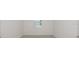 Simple bedroom with neutral walls and carpeted floor at 6826 Sw 90Th Loop, Ocala, FL 34476