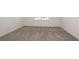 Bright bedroom with neutral walls and carpeted floor at 6826 Sw 90Th Loop, Ocala, FL 34476