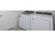 Laundry room with washer and dryer included at 6826 Sw 90Th Loop, Ocala, FL 34476