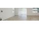 Bright living room with tile floors and sliding glass doors at 6826 Sw 90Th Loop, Ocala, FL 34476