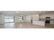 Spacious living room with tile floors and sliding glass doors at 6826 Sw 90Th Loop, Ocala, FL 34476