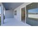Covered patio with sliding glass doors at 6826 Sw 90Th Loop, Ocala, FL 34476