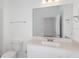 Bathroom with vanity, large mirror and toilet at 6833 Sw 90Th Loop, Ocala, FL 34476