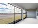 Screened porch overlooking a grassy area at 6833 Sw 90Th Loop, Ocala, FL 34476