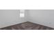 Bright bedroom with neutral walls and carpeted floor at 6829 Sw 90Th Loop, Ocala, FL 34476
