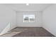 Bright bedroom with neutral walls and carpet flooring at 6829 Sw 90Th Loop, Ocala, FL 34476