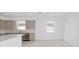 Modern kitchen with stainless steel appliances and island at 6829 Sw 90Th Loop, Ocala, FL 34476