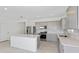 Modern kitchen with stainless steel appliances and island at 6829 Sw 90Th Loop, Ocala, FL 34476