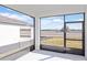 Relaxing screened porch overlooking a grassy area at 6829 Sw 90Th Loop, Ocala, FL 34476