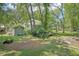 Expansive backyard with storage shed, mature trees, and room for outdoor activities at 3603 Cr 626N, Bushnell, FL 33513