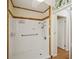 This bathroom has a walk in shower and rustic design elements at 3603 Cr 626N, Bushnell, FL 33513