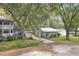 A quaint home with mature trees and landscaping that provides shade at 3603 Cr 626N, Bushnell, FL 33513